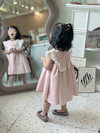 Đầm váy babydoll bé gái Anniebaby dáng xòe nhún bèo thêu hoa ở giữa cho bé từ 10 đến 25kg đi học đi chơi VA23026