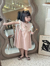Đầm váy babydoll bé gái Anniebaby dáng xòe nhún bèo thêu hoa ở giữa cho bé từ 10 đến 25kg đi học đi chơi VA23026