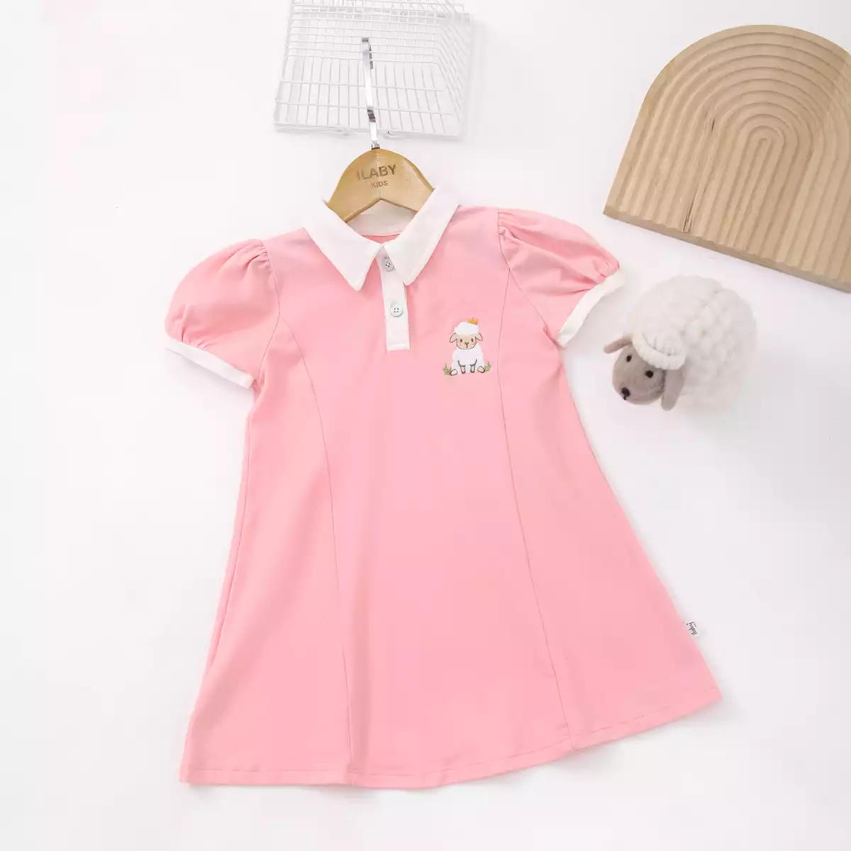 Váy polo thêu ngực bổ mảnh