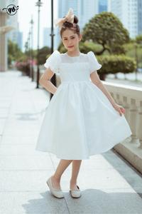 Váy trắng viền ngọc nơ nhí (Size 66 - 100)