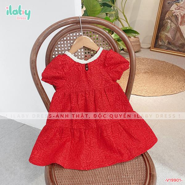 Váy gấm khoét lưng nơ sau