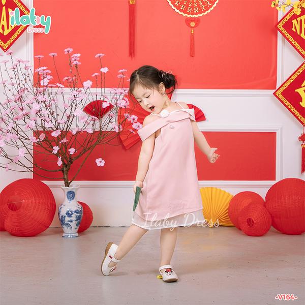 Váy hai dây cài hoa