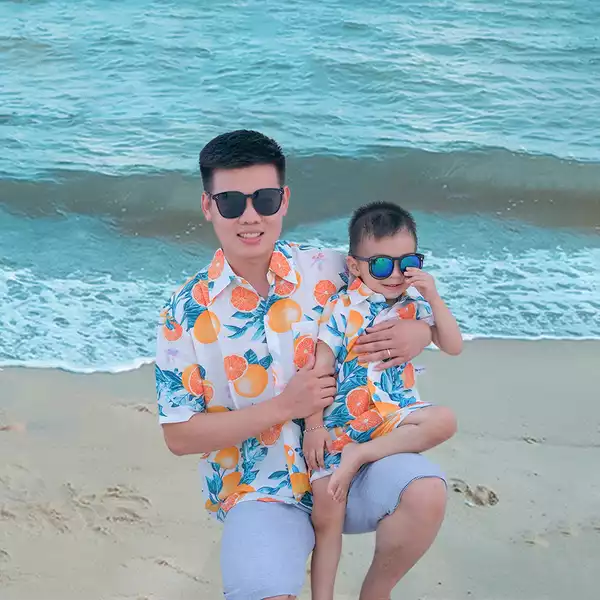 Áo sơ mi đi biển cho nam nữ MAGICKIDS đồng phục đi biển gia đình chất tơ đũi thoáng mát họa tiết hoa lá AO22034
