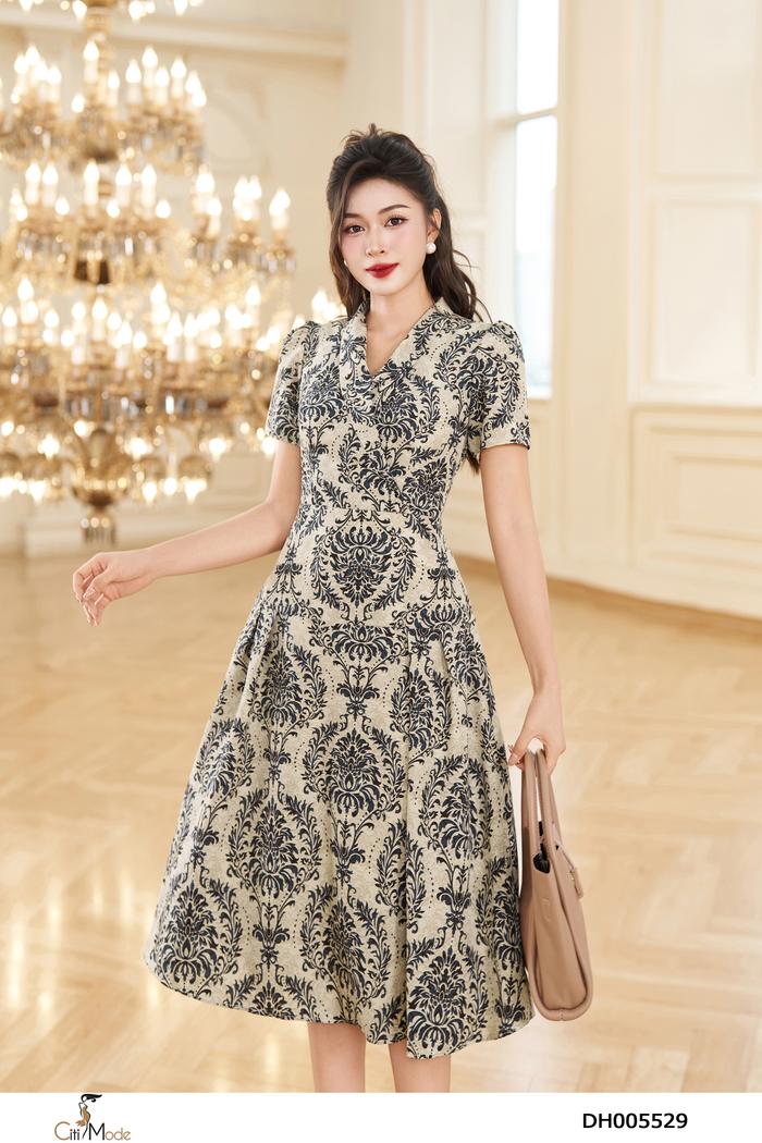 Đầm xòe hoa tiết nổi cổ vest tay cộc