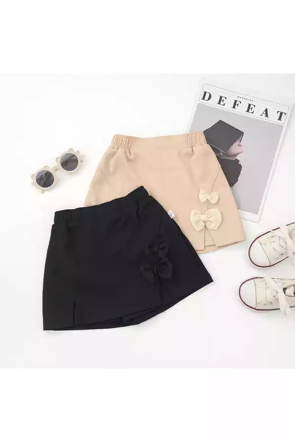 Quần váy xẻ phối nơ