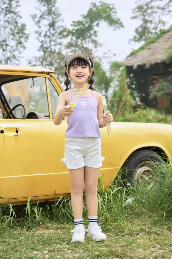 Quần sooc vạt cong phối nơ