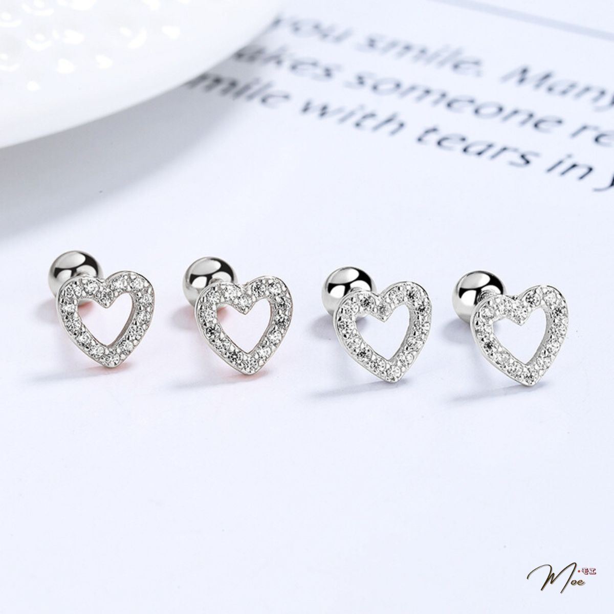 K256 - Khuyên tai trái tim viền đá điệu đà