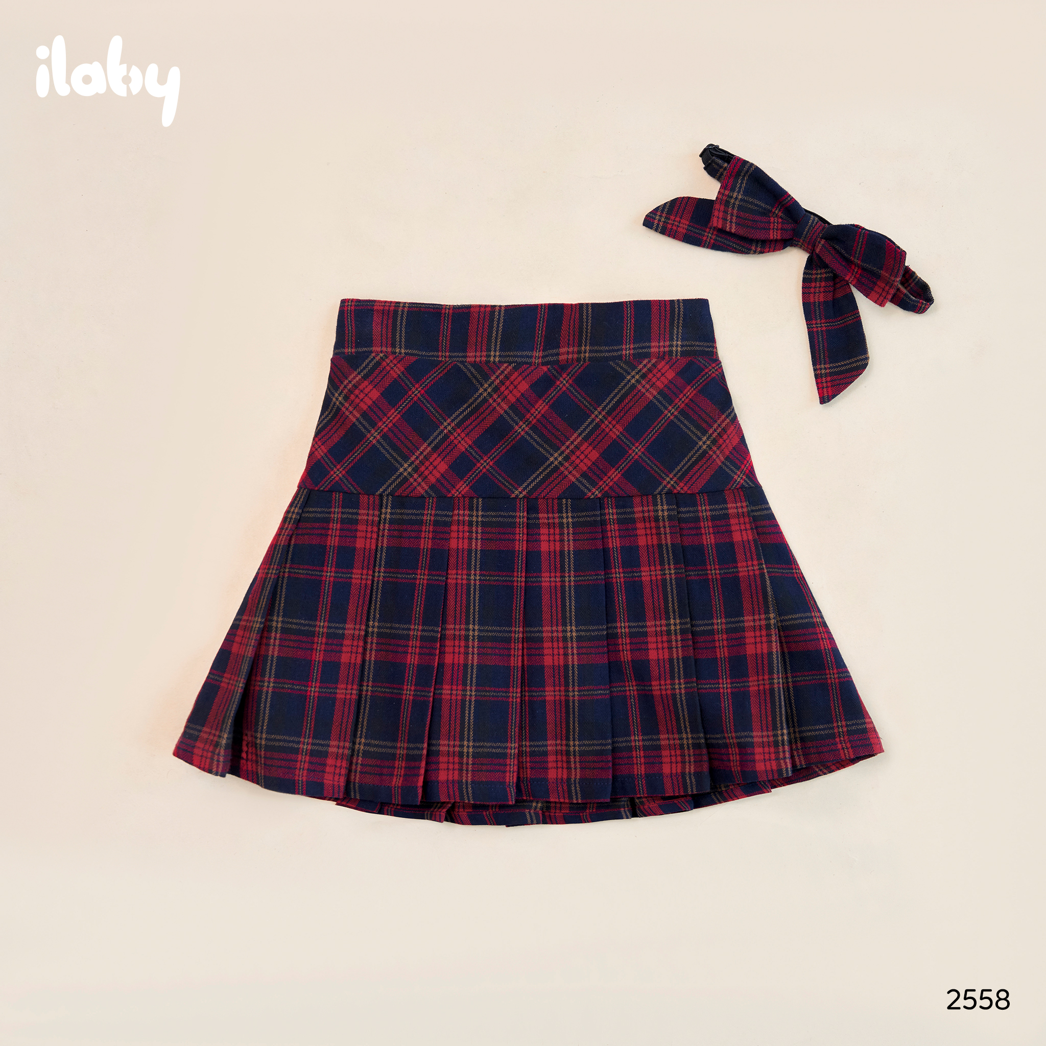 Chân váy kẻ phối can xếp ly