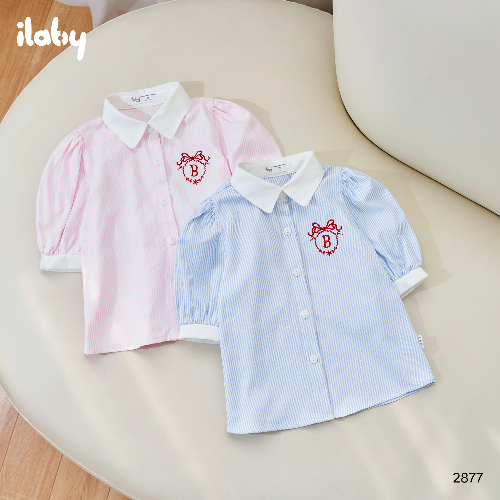 Áo sơ mi kẻ phối màu thêu nơ