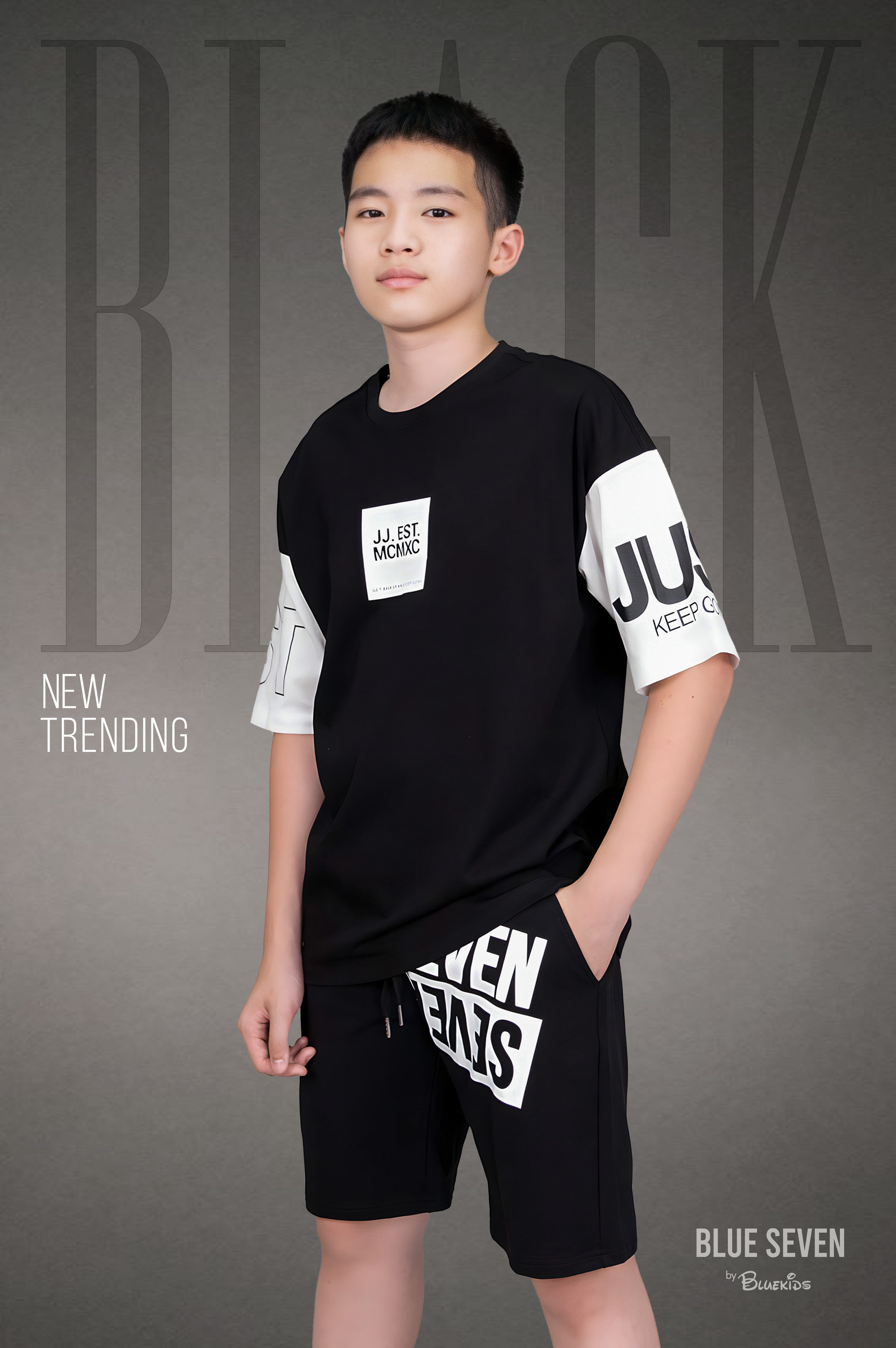 Áo phông dáng rộng đen phối tay trắng in chữ EST_thumbnail_0