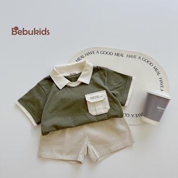 Bộ polo cổ v túi ngực in chữ