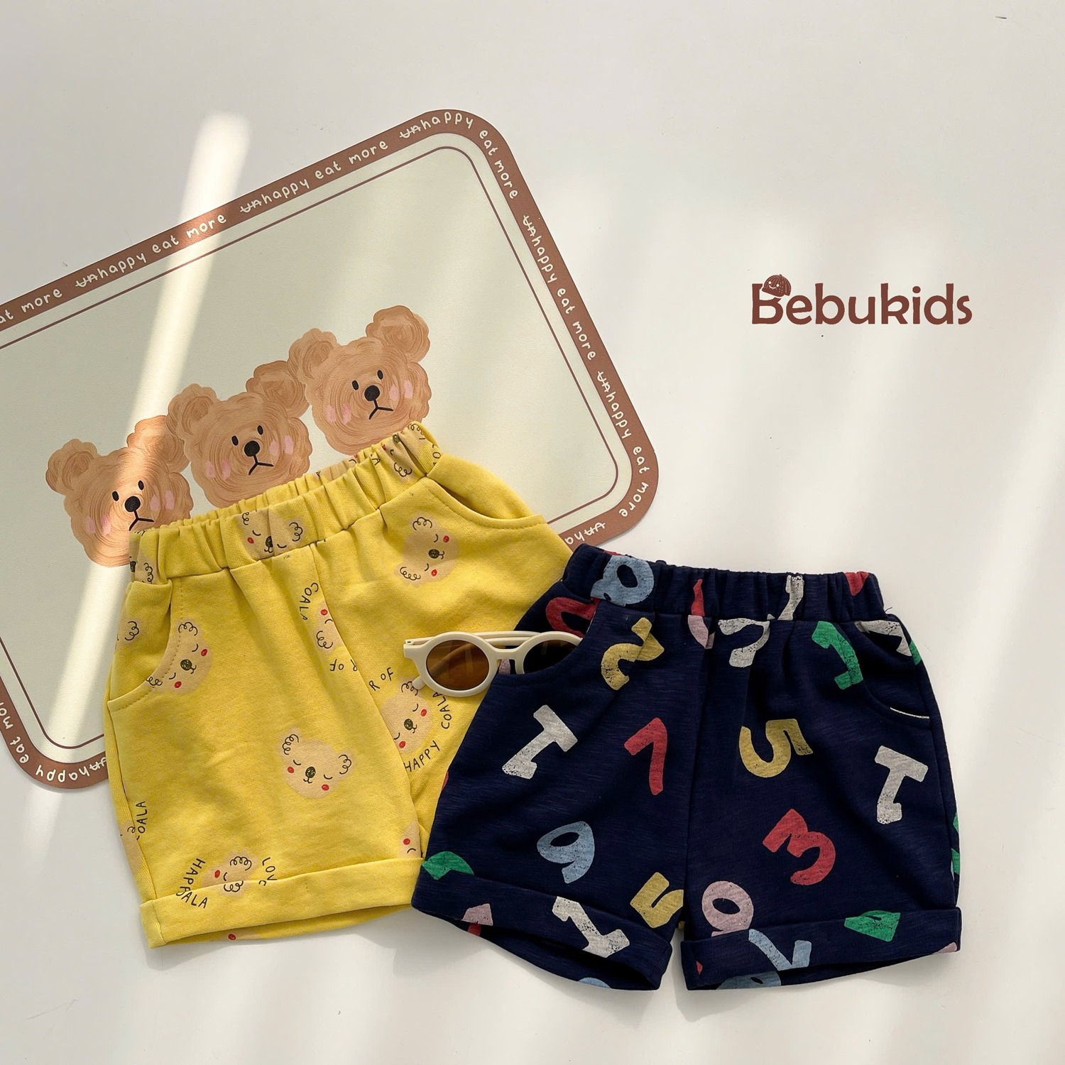 SB2232- bộ polo diễu chỉ nổi túi ngực phối quần gấu, chữ số