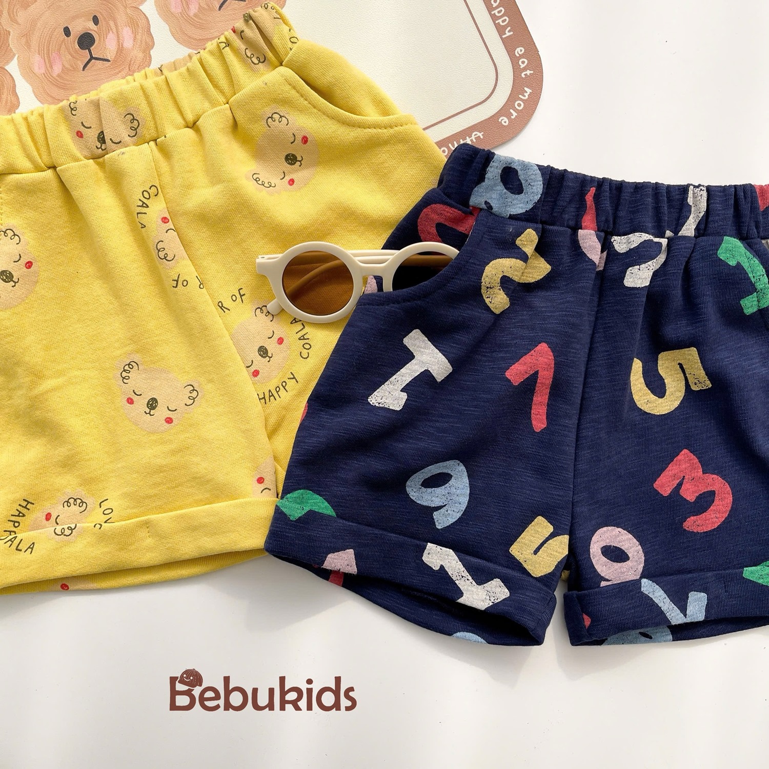 SB2232- bộ polo diễu chỉ nổi túi ngực phối quần gấu, chữ số