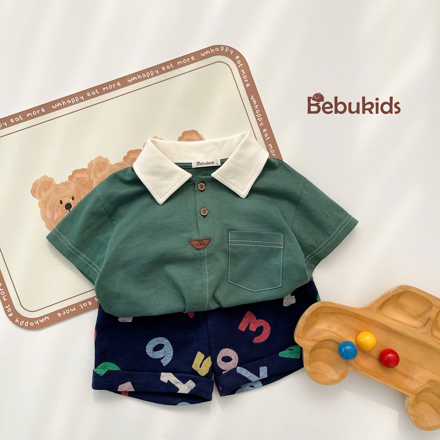 SB2232- bộ polo diễu chỉ nổi túi ngực phối quần gấu, chữ số xanh