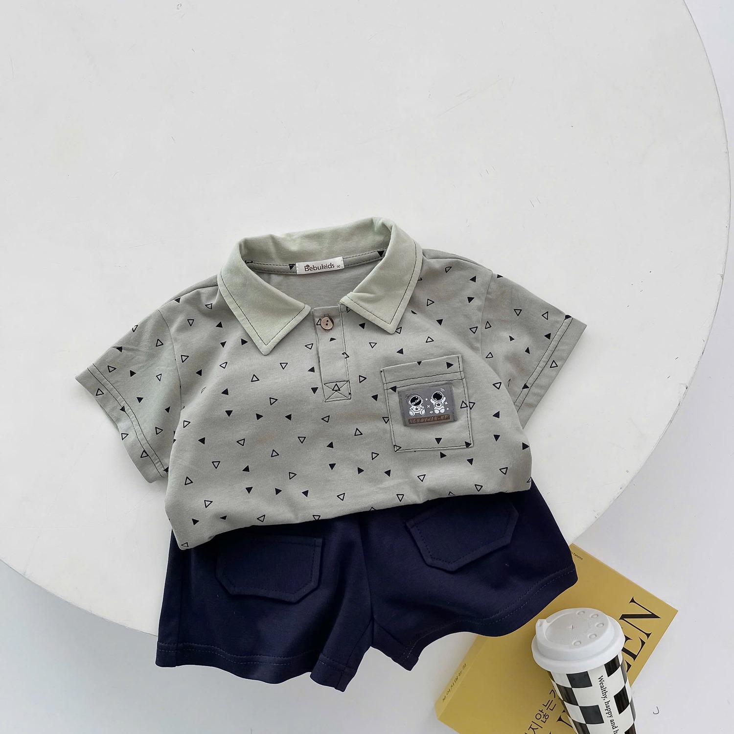 SB2249- bộ polo cộc tay logo phi hành gia xanh