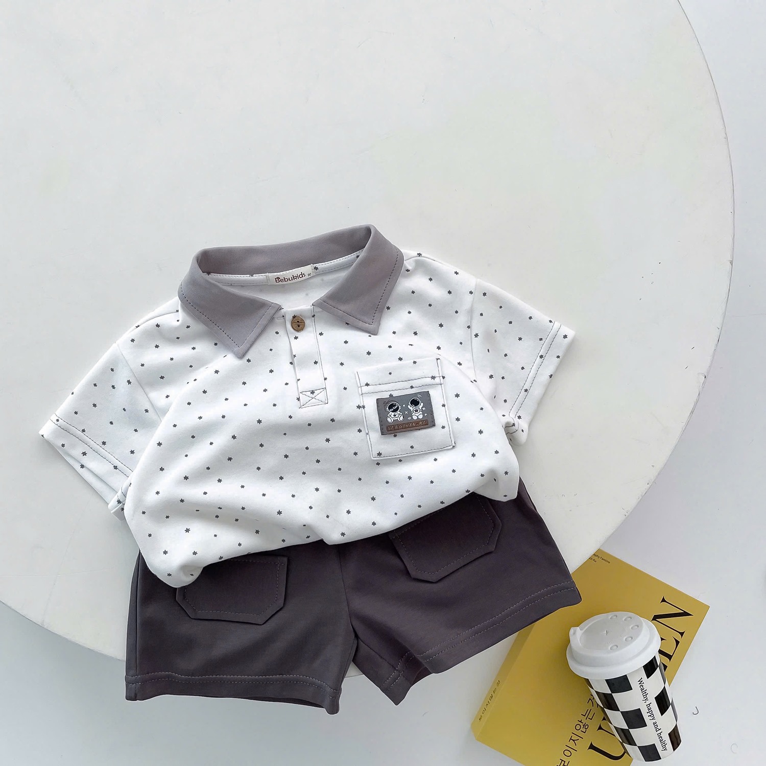 SB2249- bộ polo cộc tay logo phi hành gia trắng