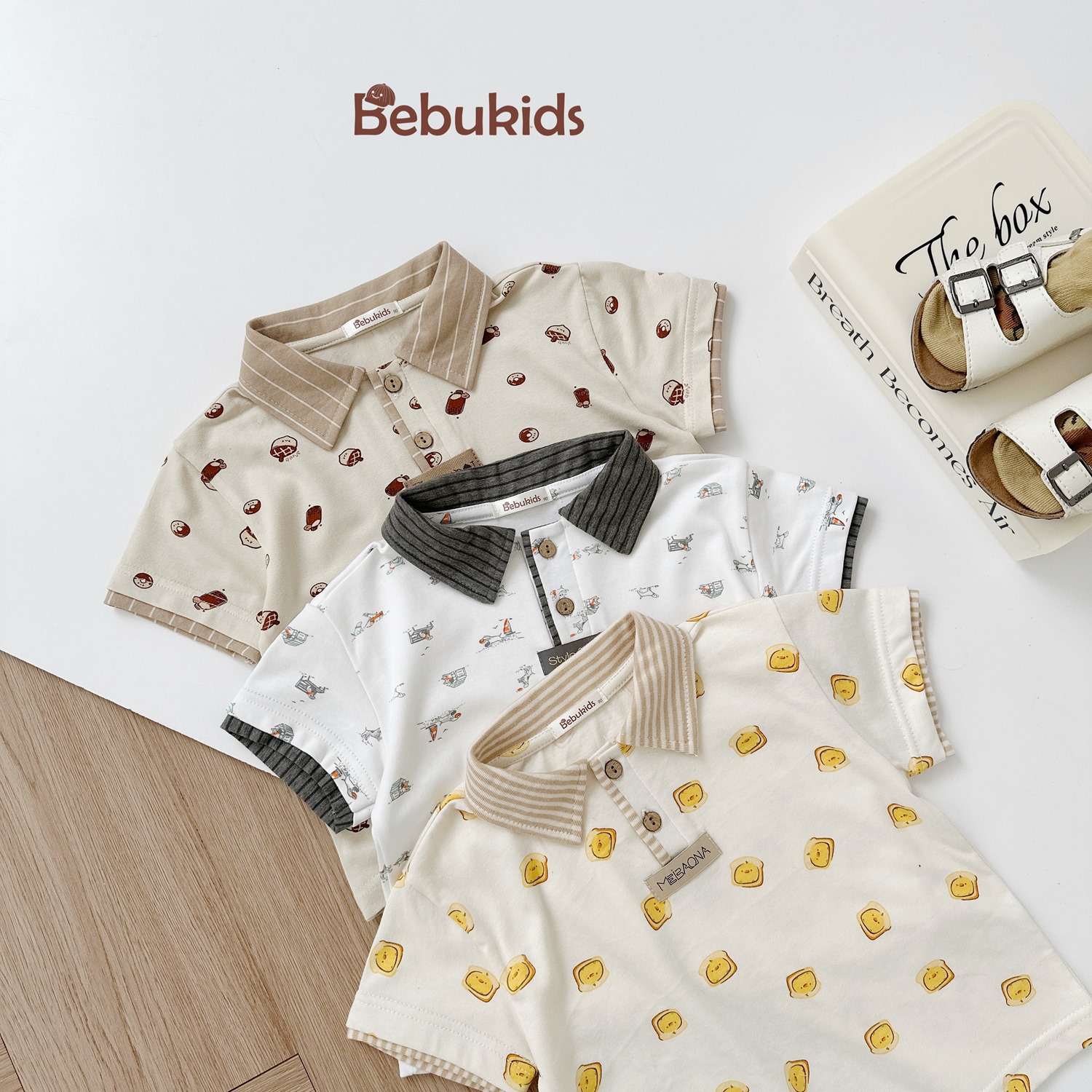 SB2122- bộ polo phối cổ tay nẹp, in họa tiết ngôi nhà, bánh quy