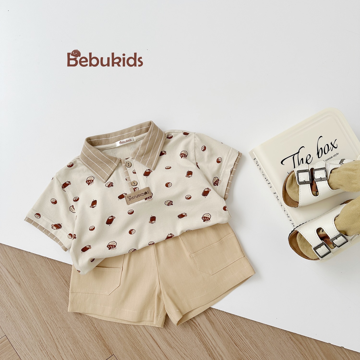 SB2122- bộ polo phối cổ tay nẹp, in họa tiết ngôi nhà, bánh quy quả thông