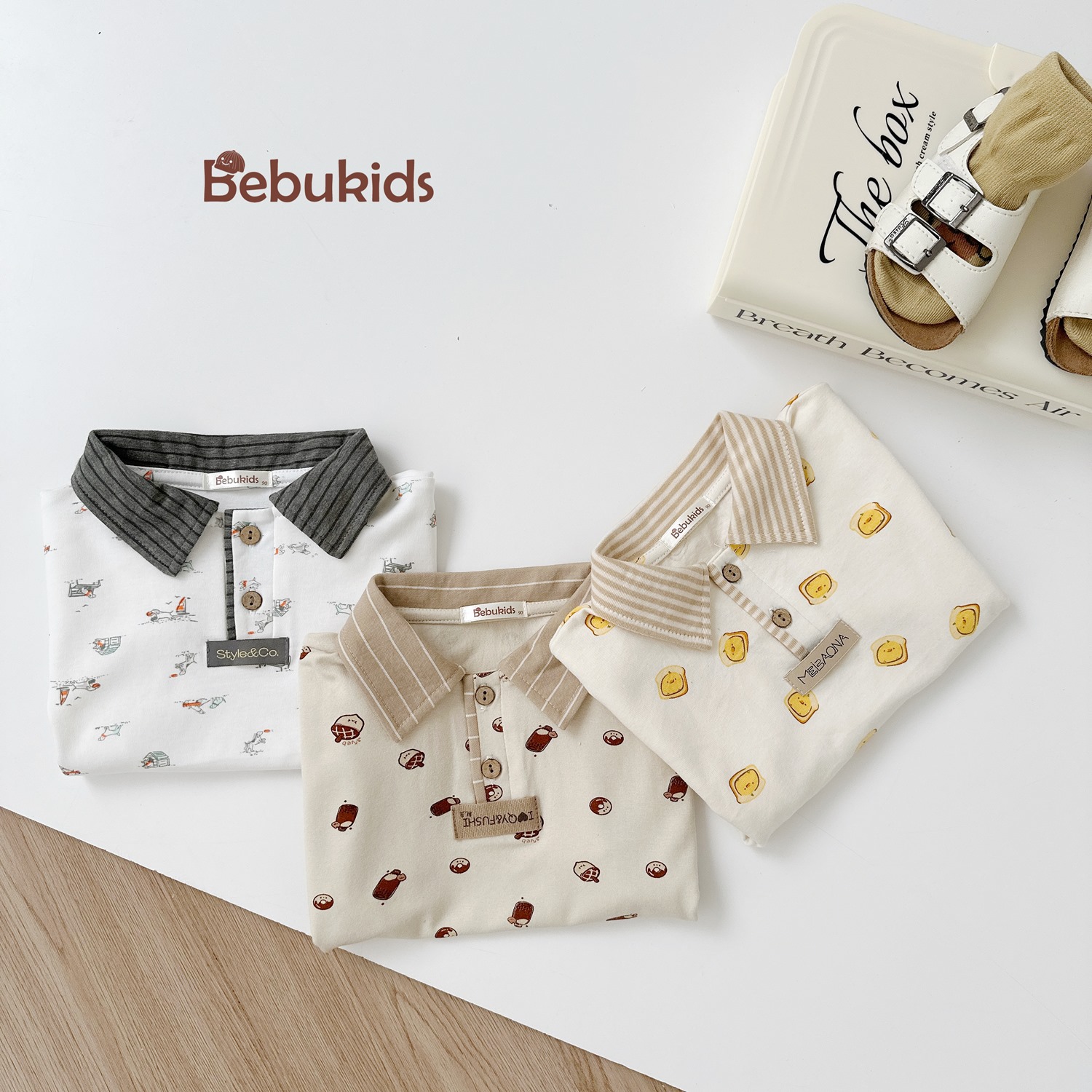 SB2122- bộ polo phối cổ tay nẹp, in họa tiết ngôi nhà, bánh quy