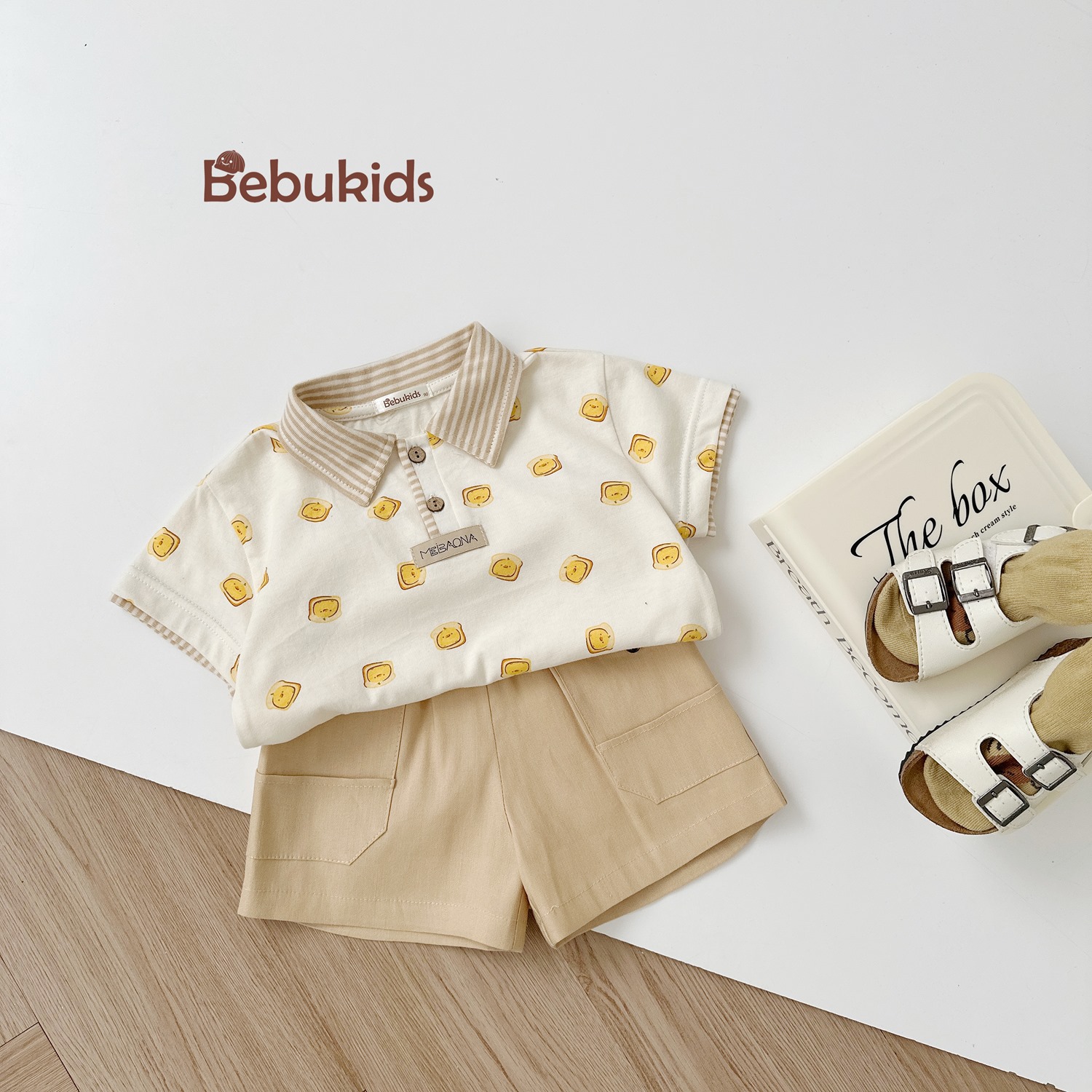 SB2122- bộ polo phối cổ tay nẹp, in họa tiết ngôi nhà, bánh quy bánh mỳ