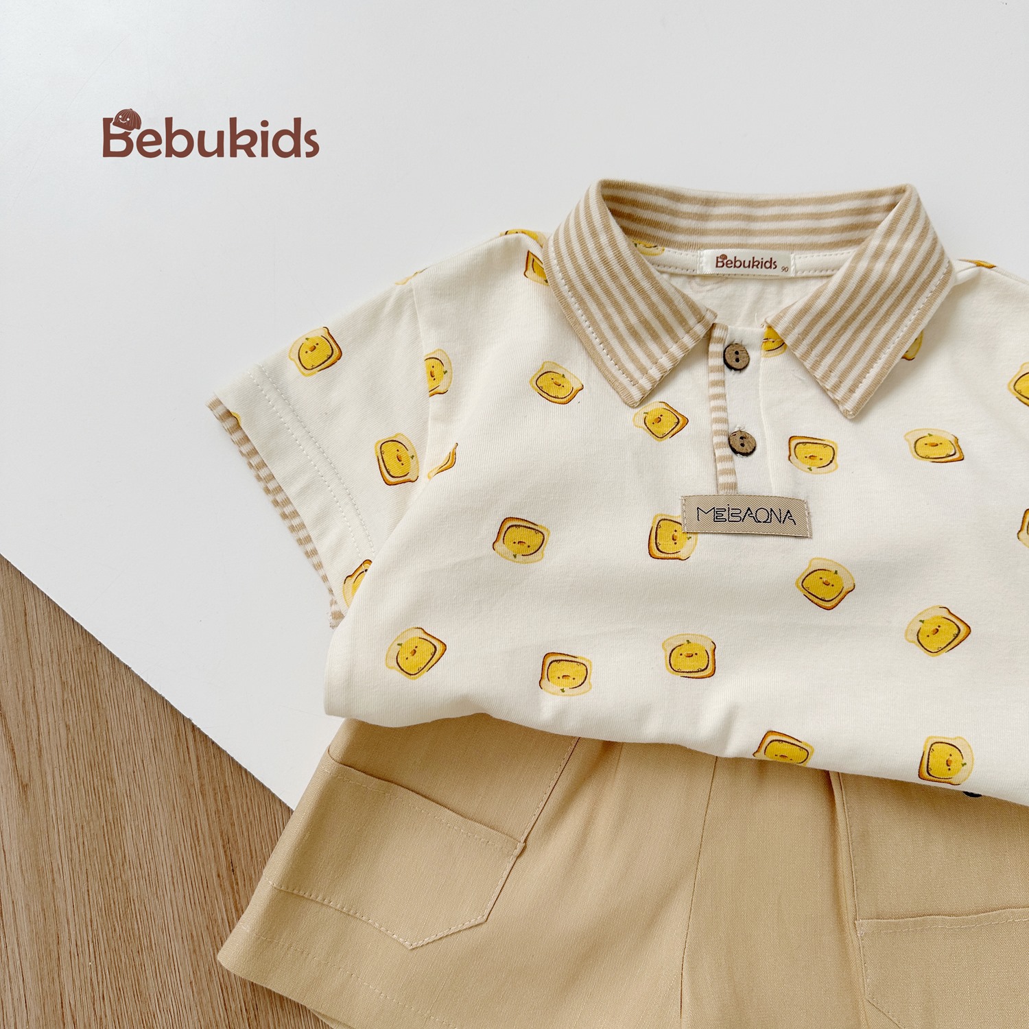 SB2122- bộ polo phối cổ tay nẹp, in họa tiết ngôi nhà, bánh quy
