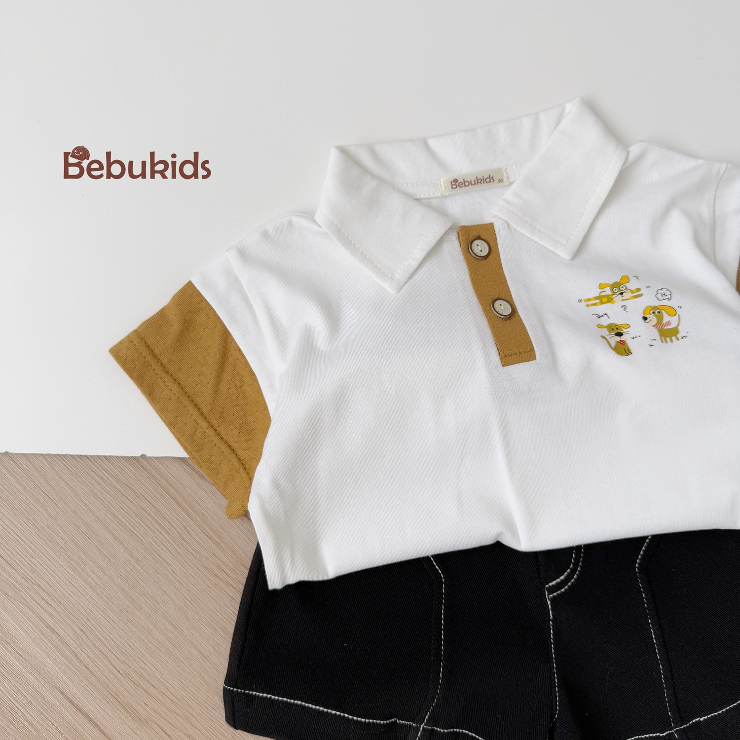 SB2261- bộ polo phối nẹp, tayin 3 chú cún ngực