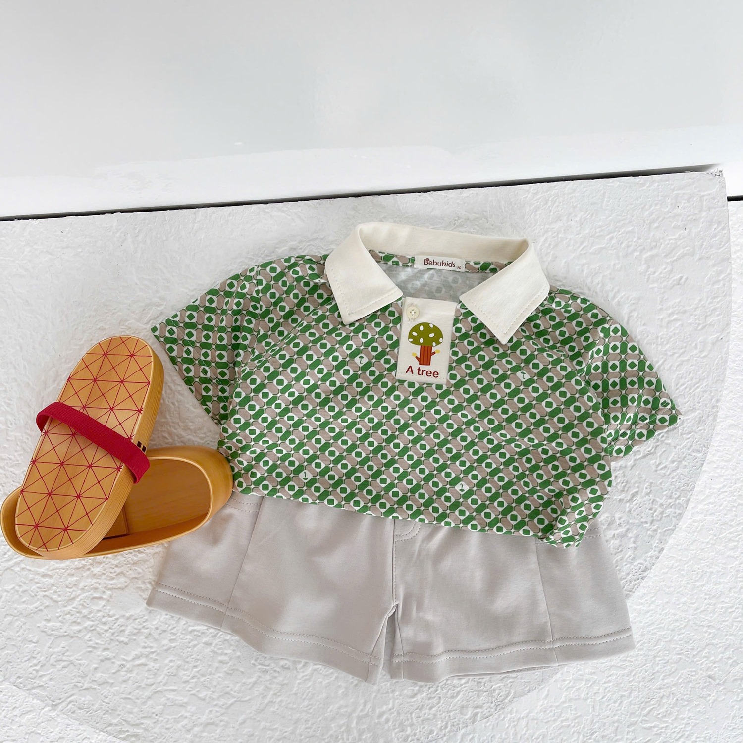 SB2277- bộ polo chấm tròn kẻ phối cổ nẹp, in cây ở nẹp xanh