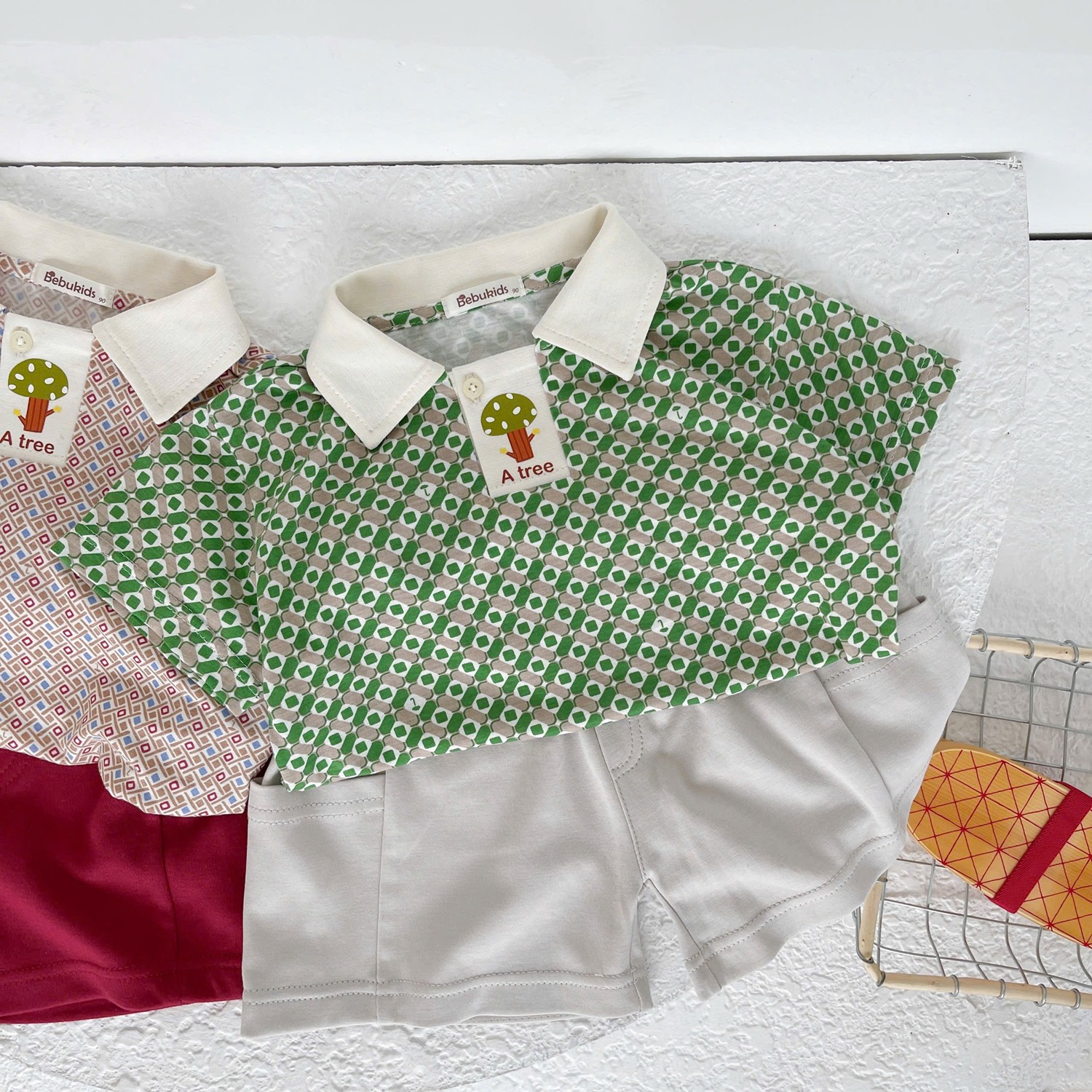 SB2277- bộ polo chấm tròn kẻ phối cổ nẹp, in cây ở nẹp