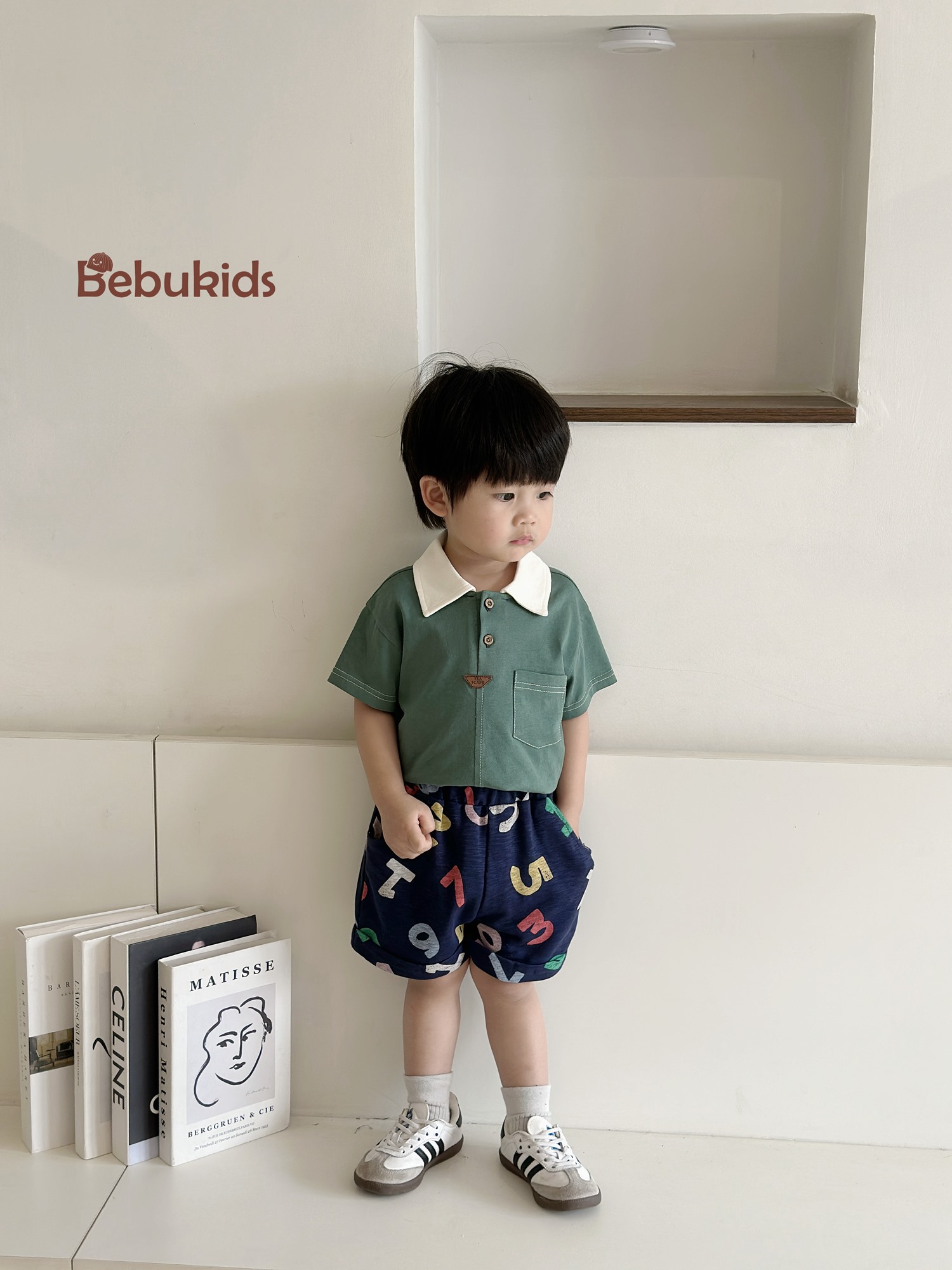 SB2232- bộ polo diễu chỉ nổi túi ngực phối quần gấu, chữ số
