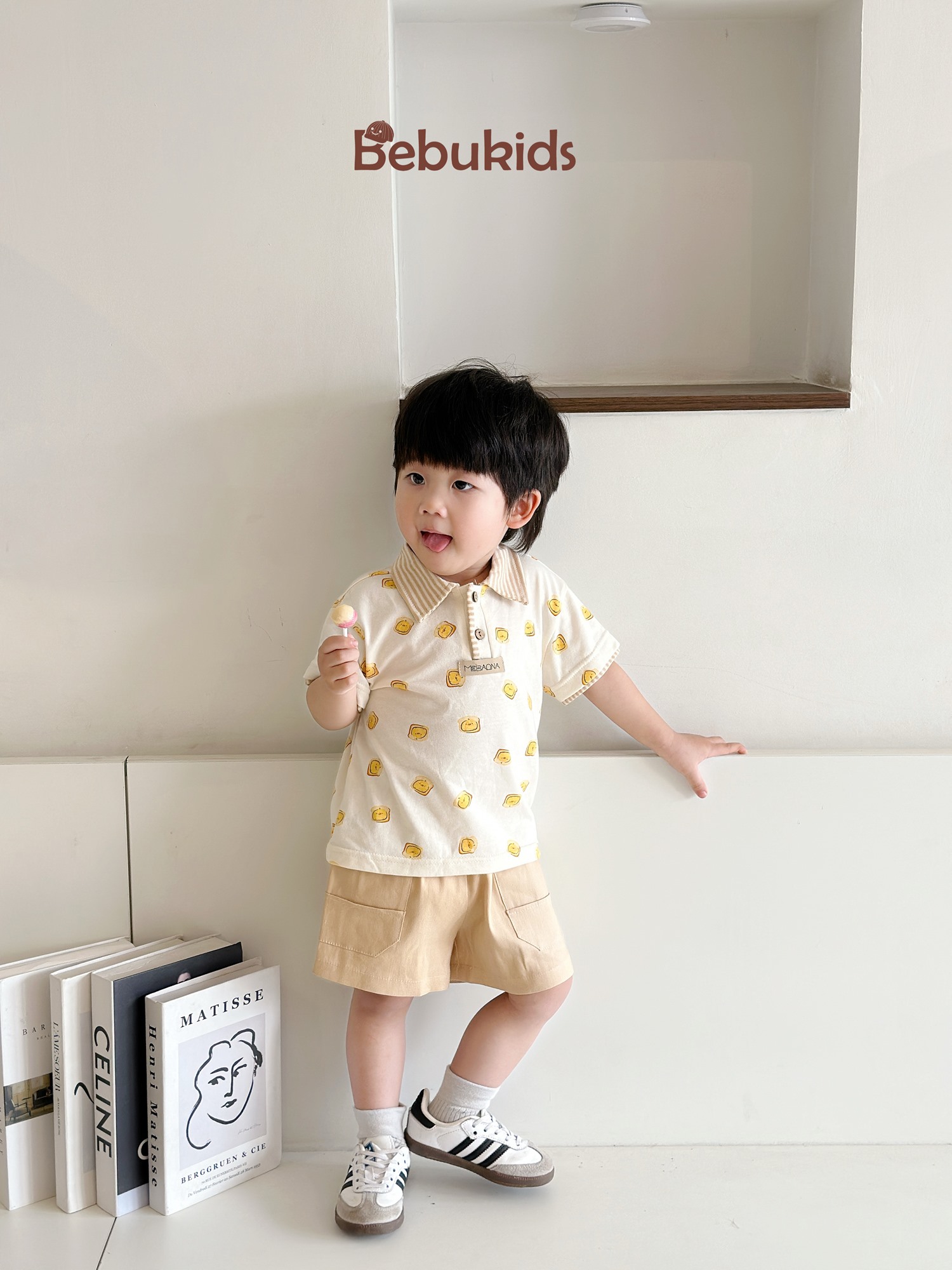 SB2122- bộ polo phối cổ tay nẹp, in họa tiết ngôi nhà, bánh quy