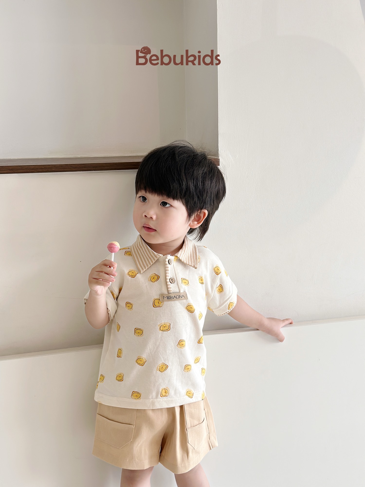 SB2122- bộ polo phối cổ tay nẹp, in họa tiết ngôi nhà, bánh quy