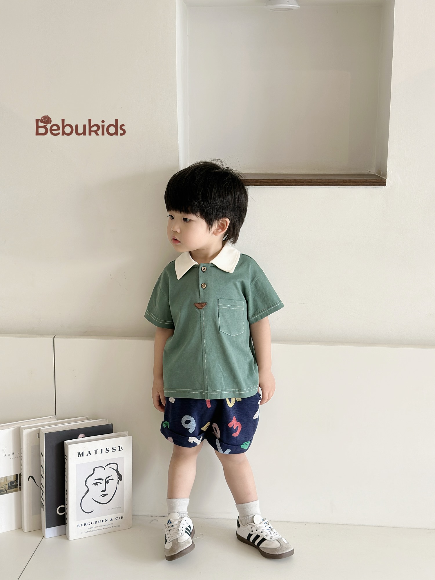SB2232- bộ polo diễu chỉ nổi túi ngực phối quần gấu, chữ số