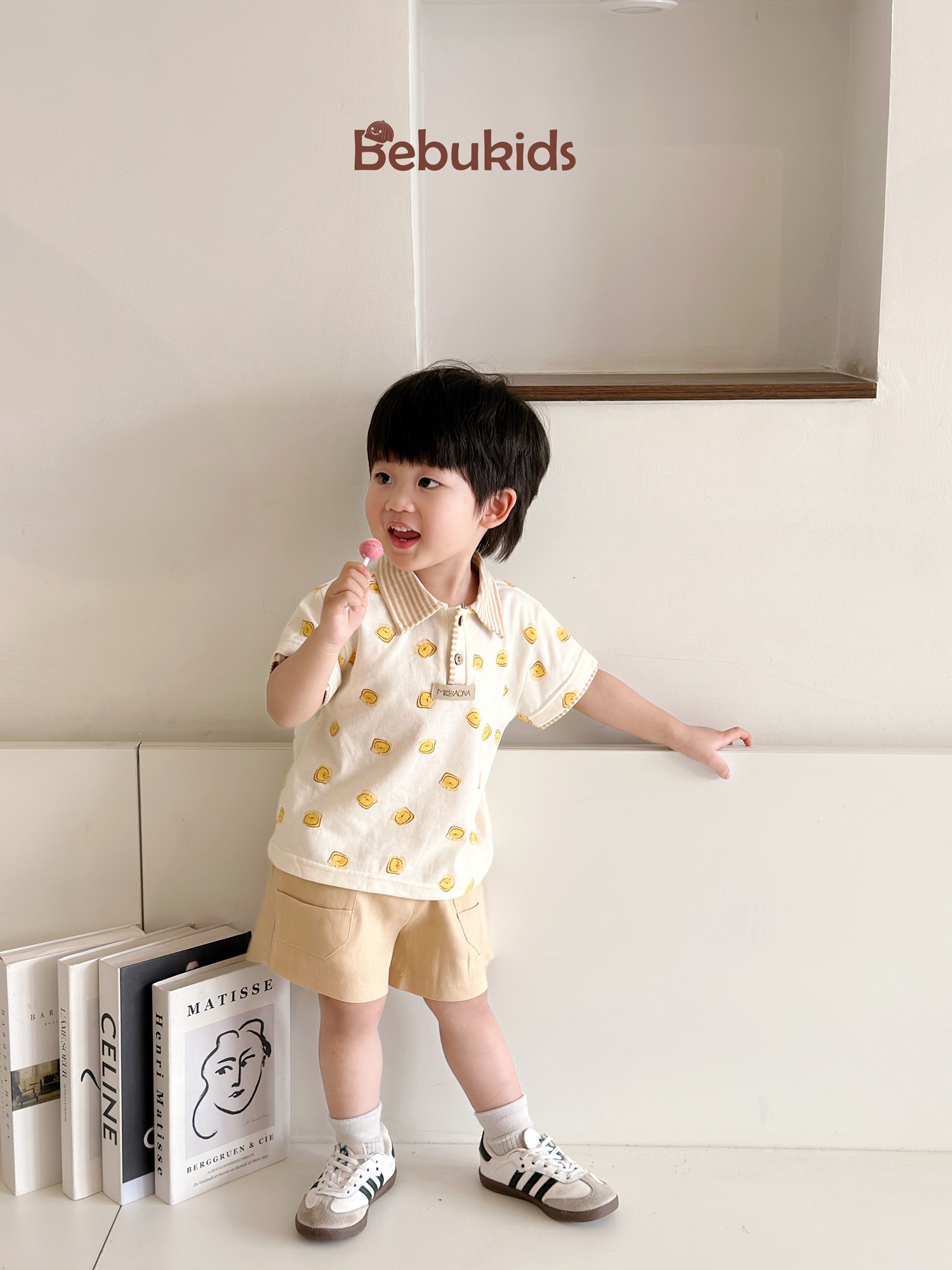 SB2122- bộ polo phối cổ tay nẹp, in họa tiết ngôi nhà, bánh quy