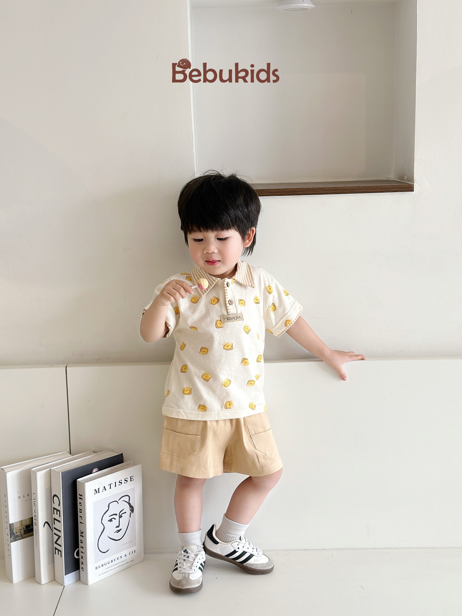 SB2122- bộ polo phối cổ tay nẹp, in họa tiết ngôi nhà, bánh quy