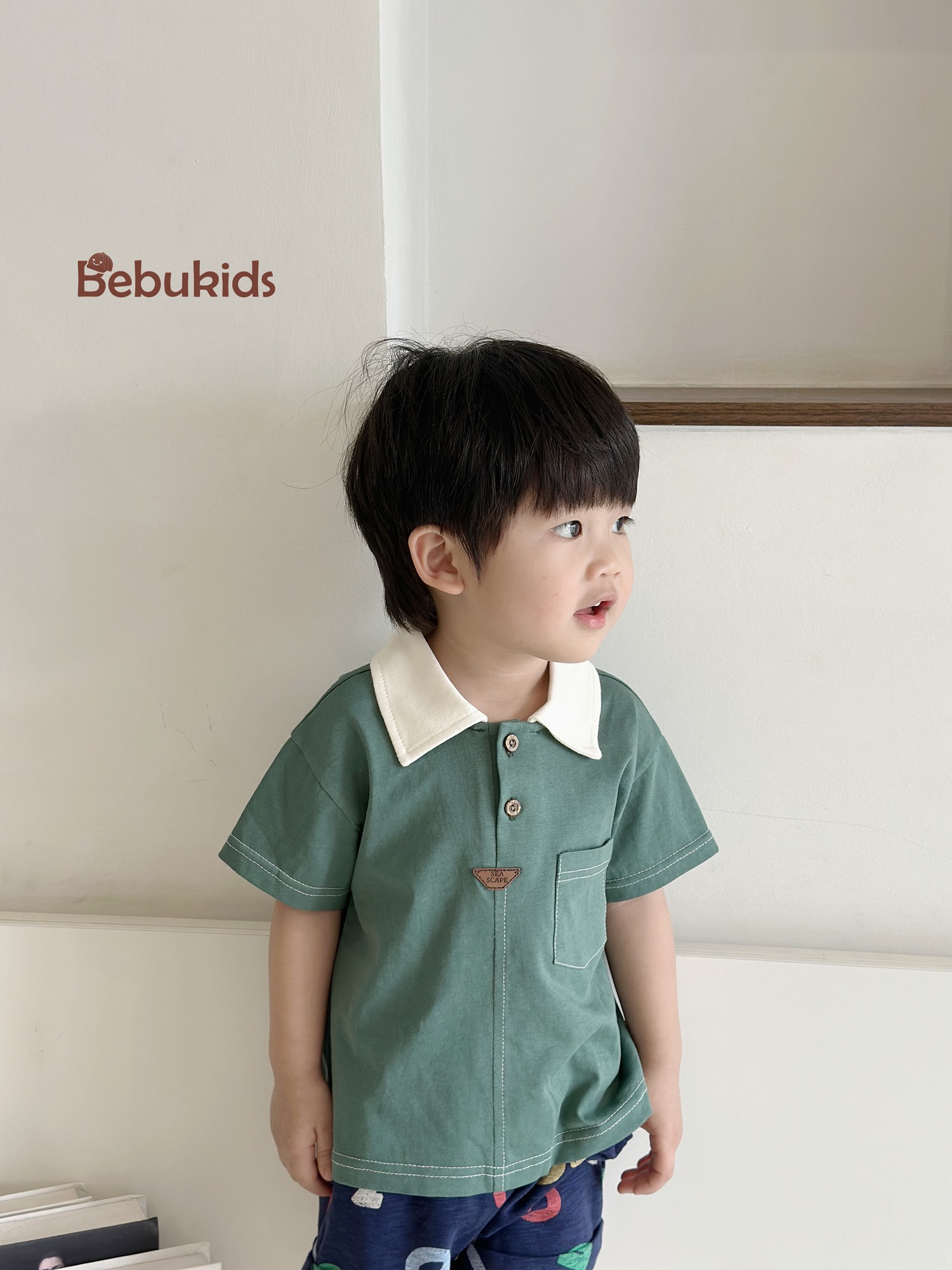 SB2232- bộ polo diễu chỉ nổi túi ngực phối quần gấu, chữ số