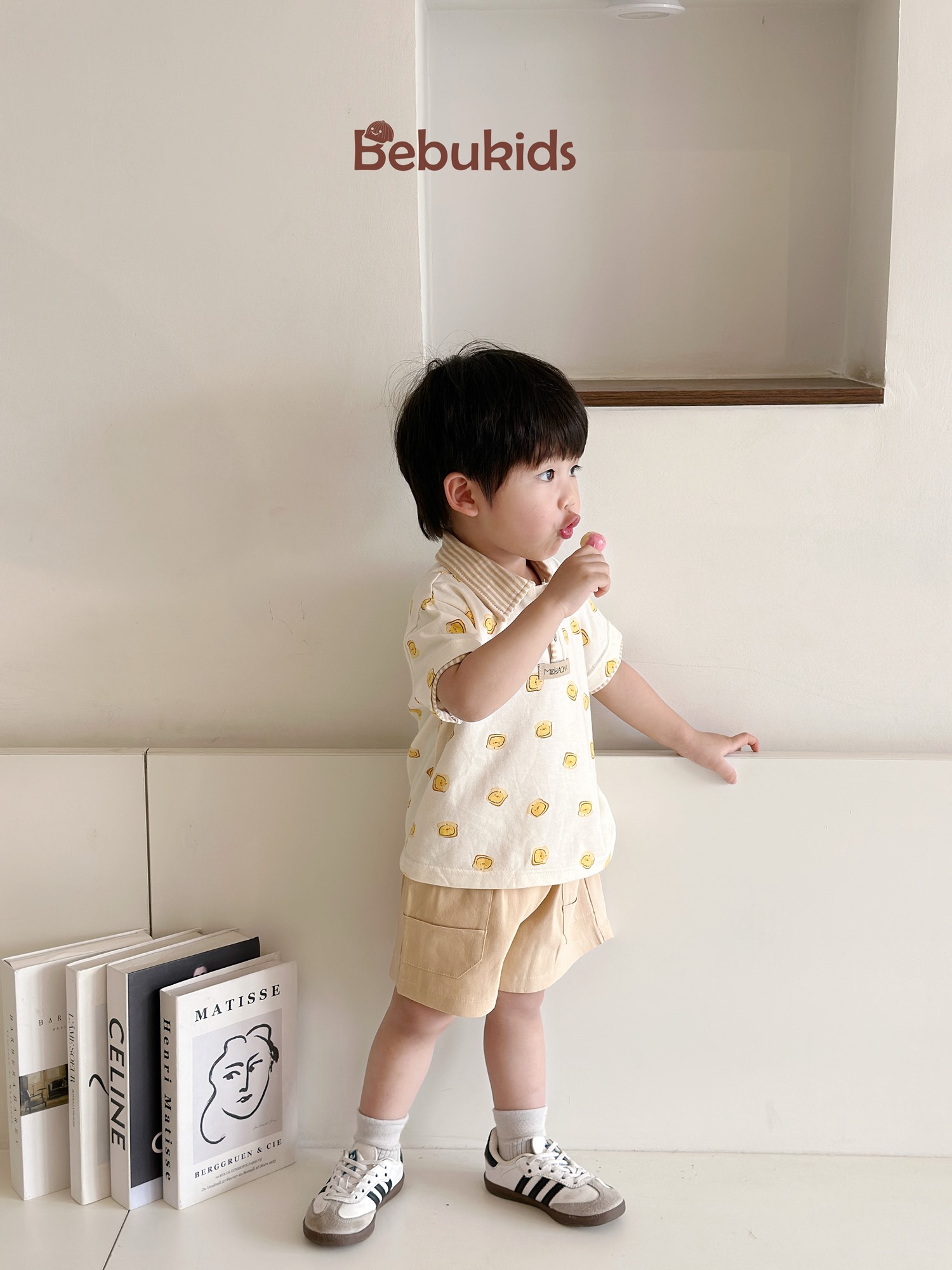 SB2122- bộ polo phối cổ tay nẹp, in họa tiết ngôi nhà, bánh quy