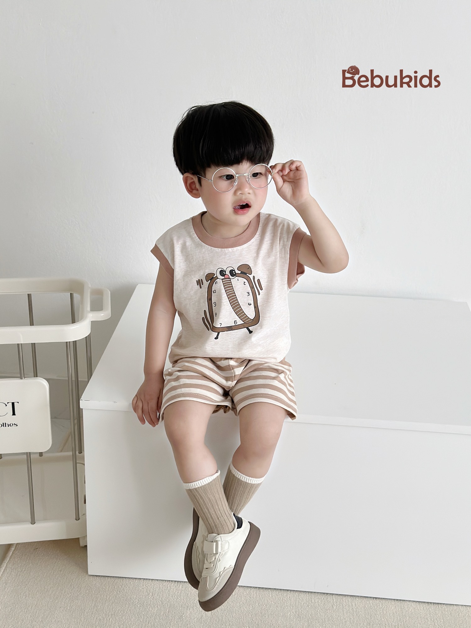 SB2318- bộ sát nách in đồng hồ phối quần kẻ