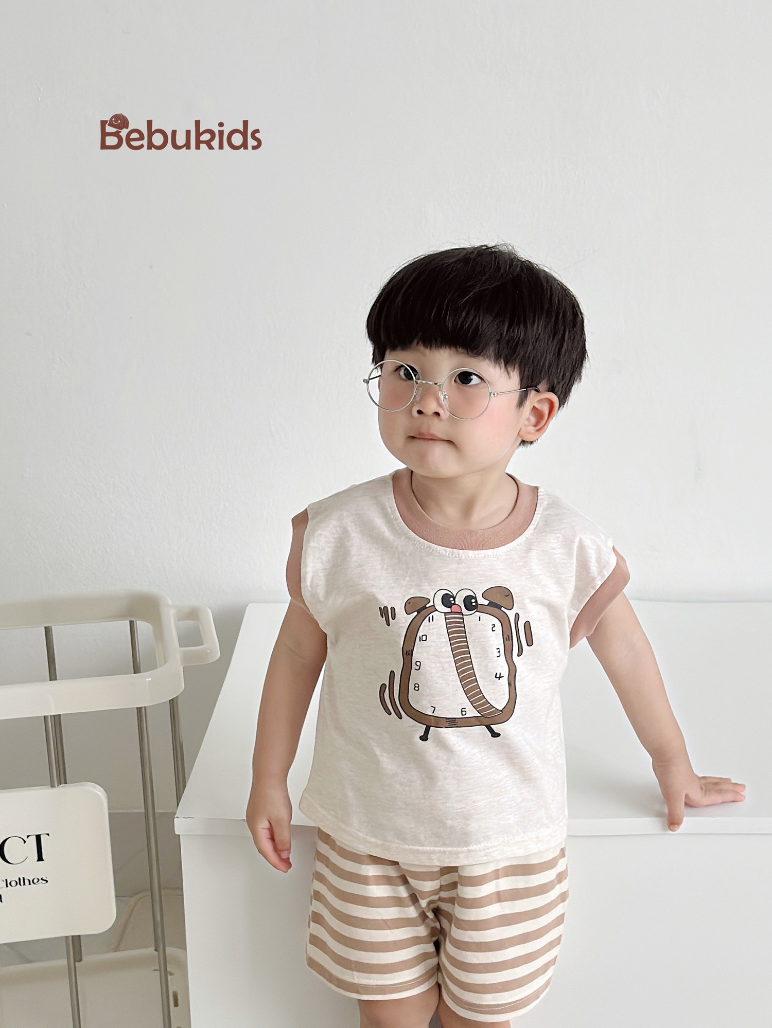 SB2318- bộ sát nách in đồng hồ phối quần kẻ