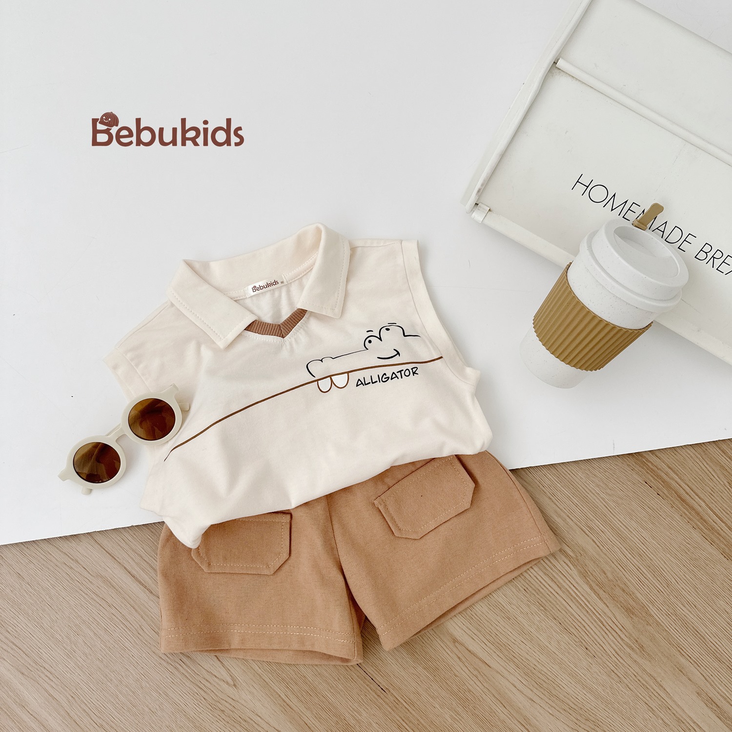 SB2344- bộ polo cổ v in chữ cá sấu ngực be