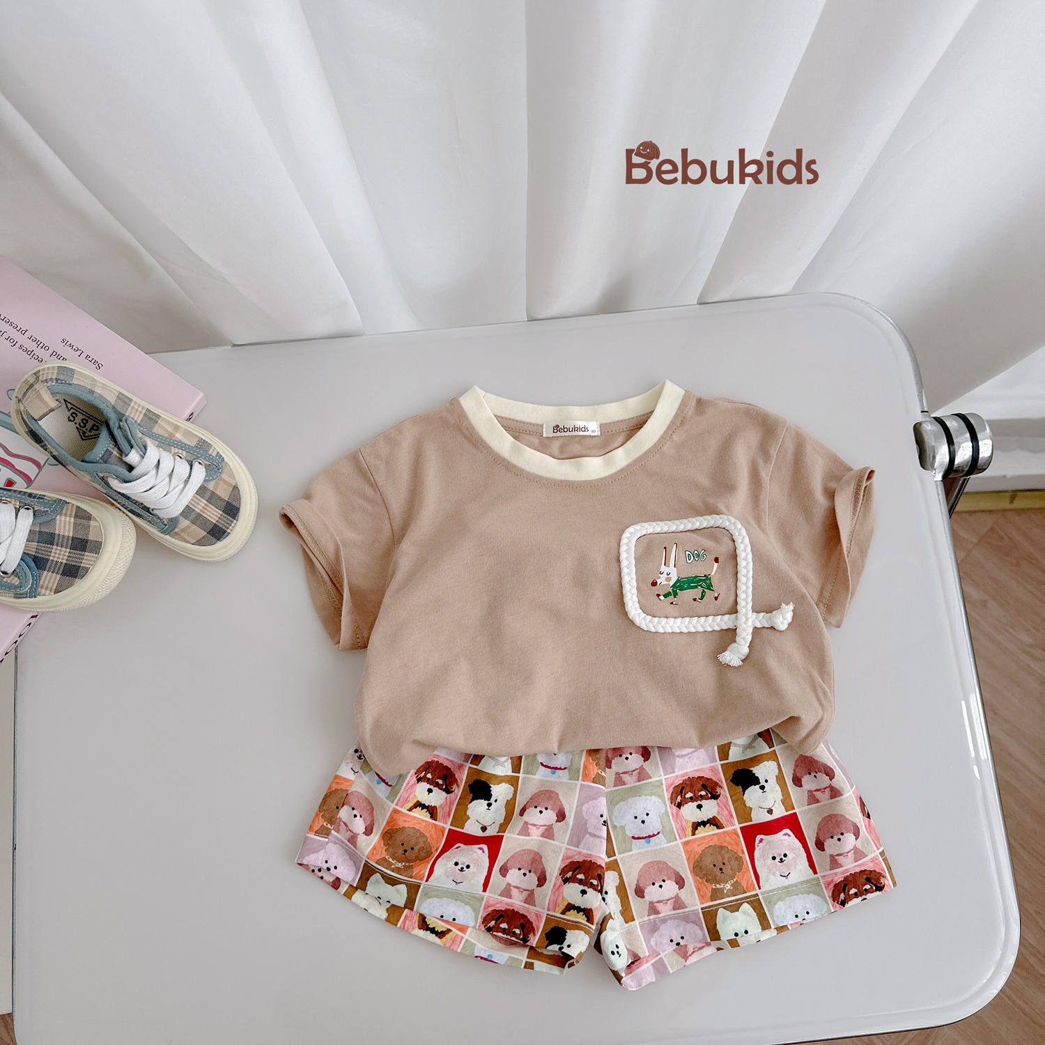 SB2330- bộ cộc tay túi viền dây in chú cũn phối quần karo cún nâu
