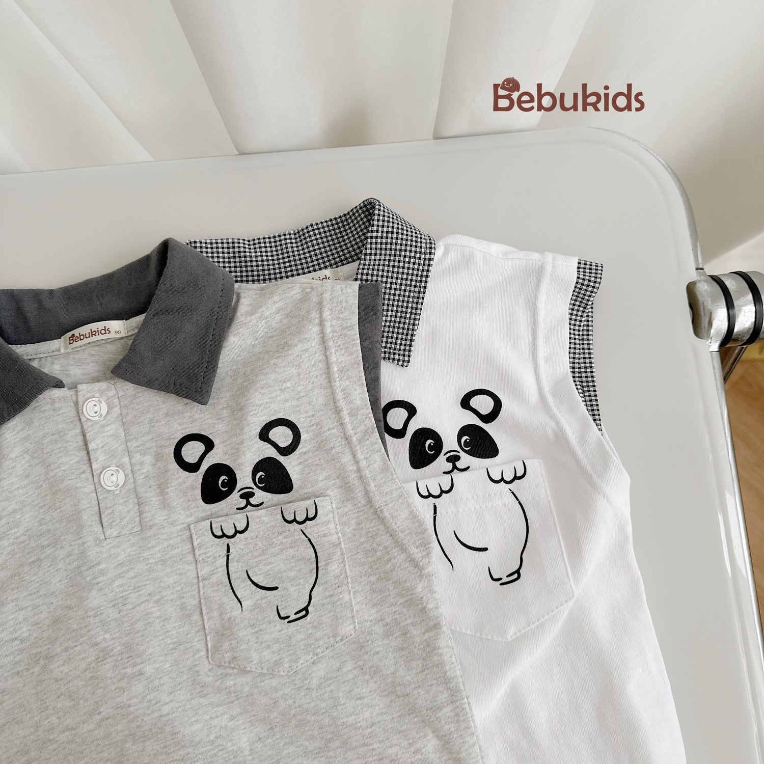 SB2342- bộ polo sát nách ngực in gấu trúc