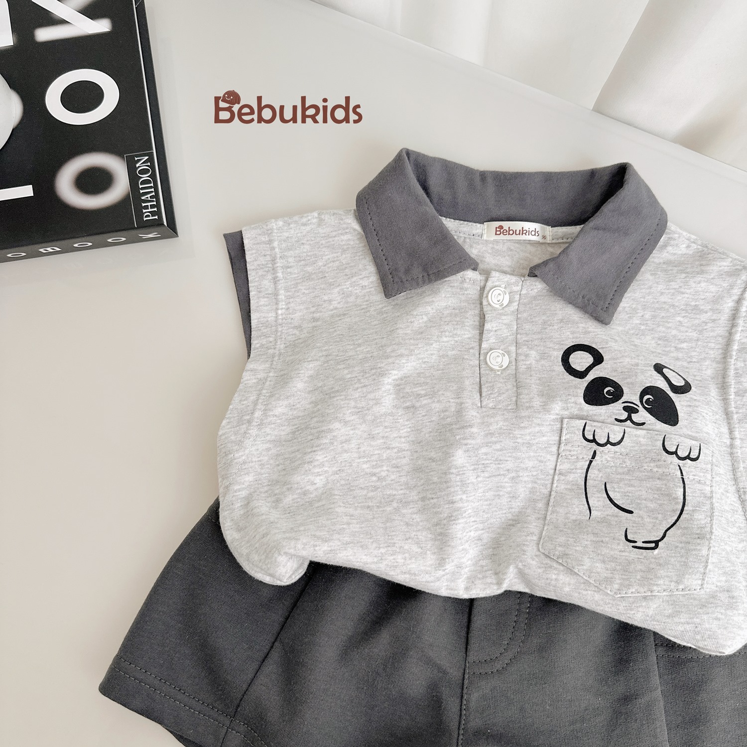 SB2342- bộ polo sát nách ngực in gấu trúc