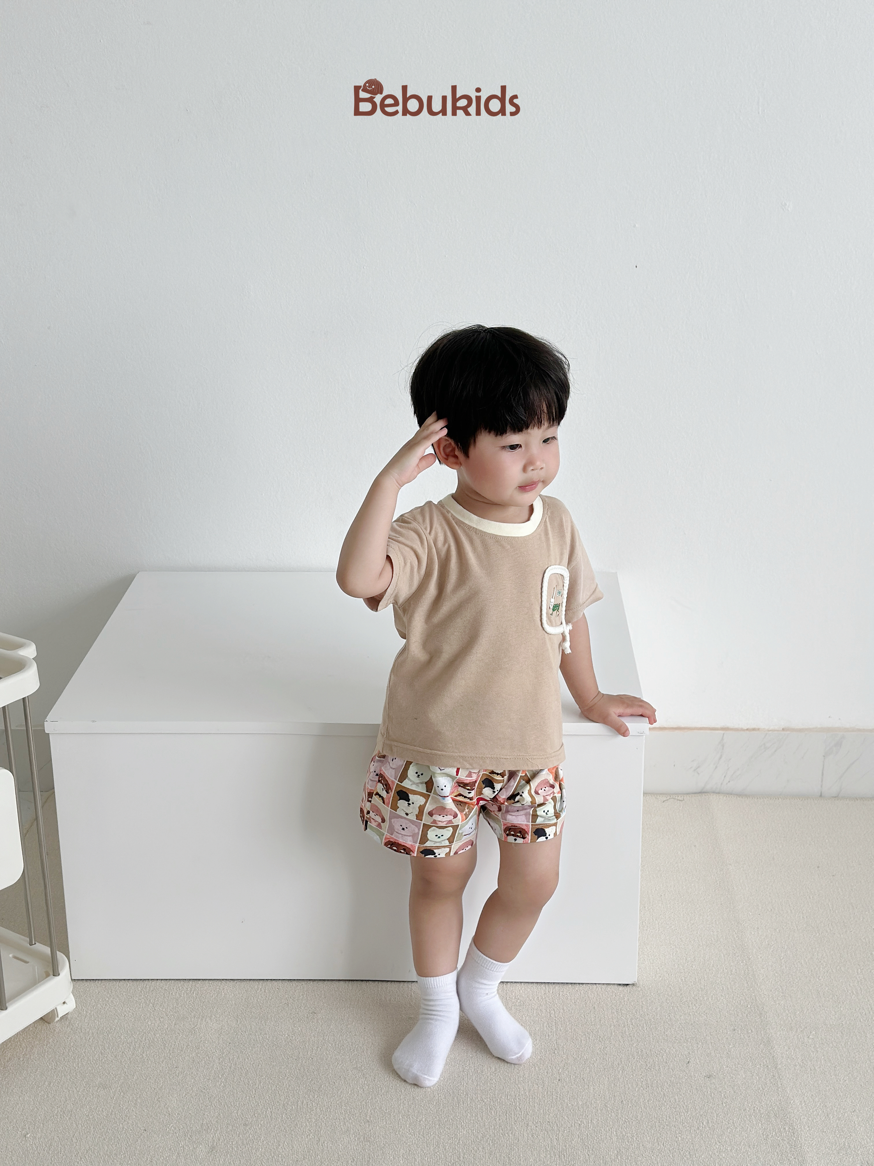 SB2330- bộ cộc tay túi viền dây in chú cũn phối quần karo cún