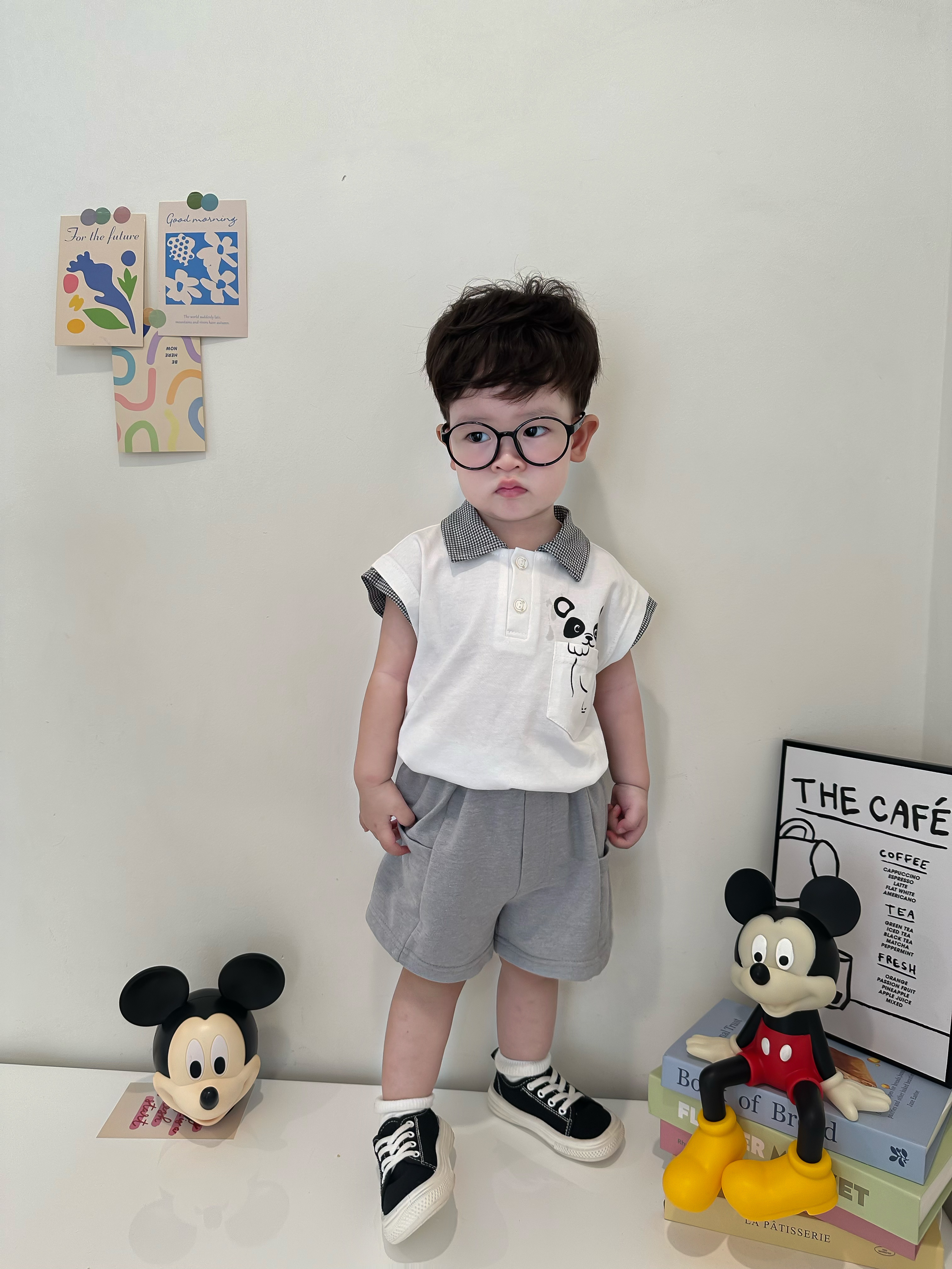 SB2342- bộ polo sát nách ngực in gấu trúc