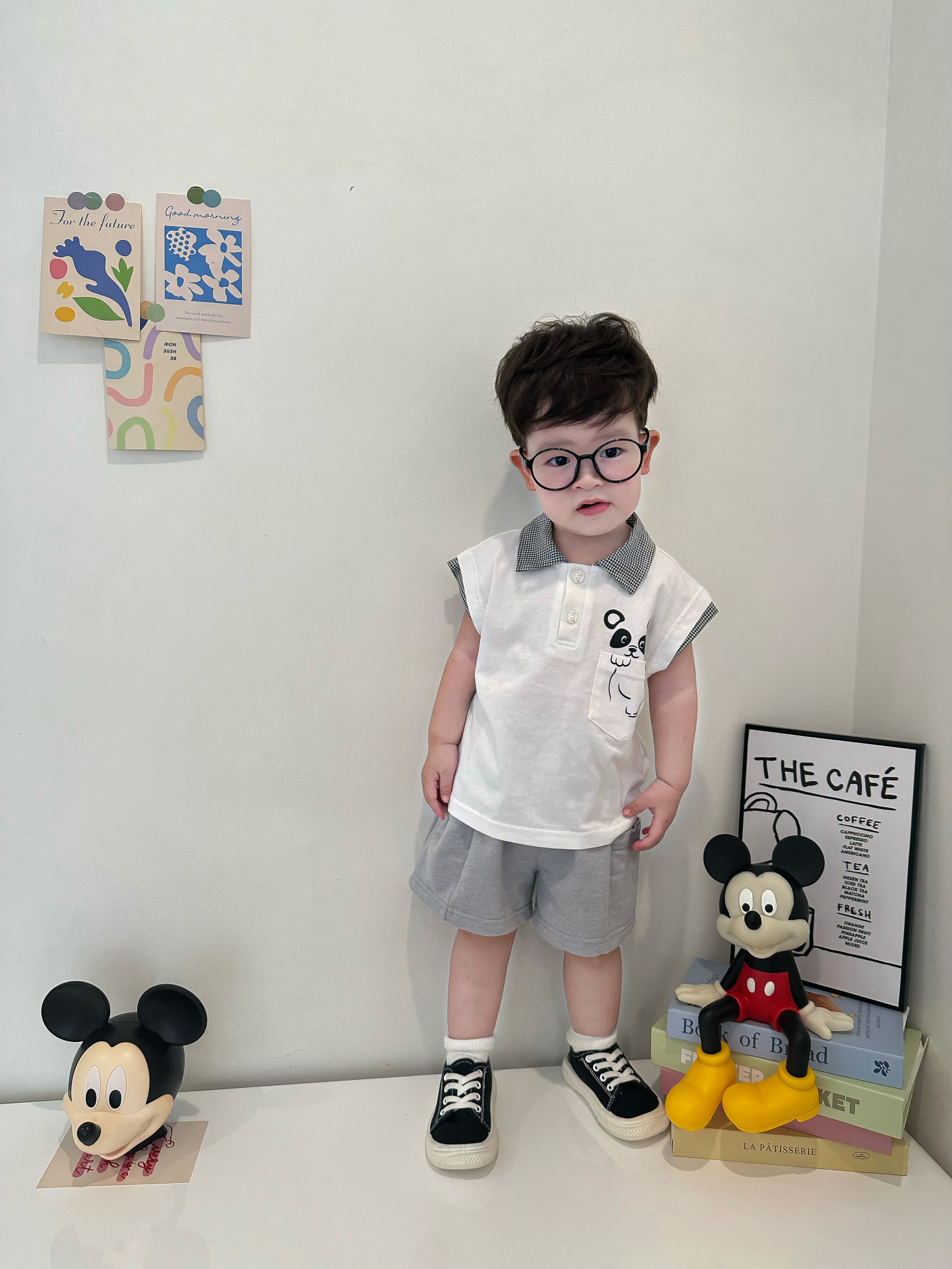 SB2342- bộ polo sát nách ngực in gấu trúc