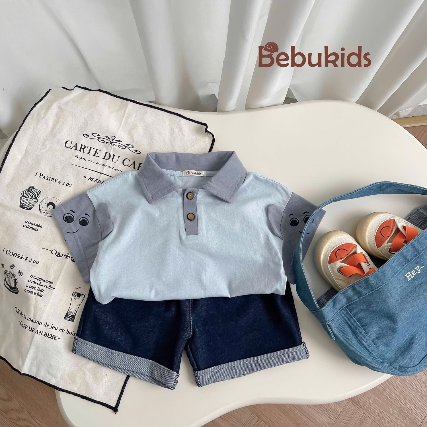 SB2346- bộ polo phối cổ, nẹp tay áo in mắt đính tai xanh