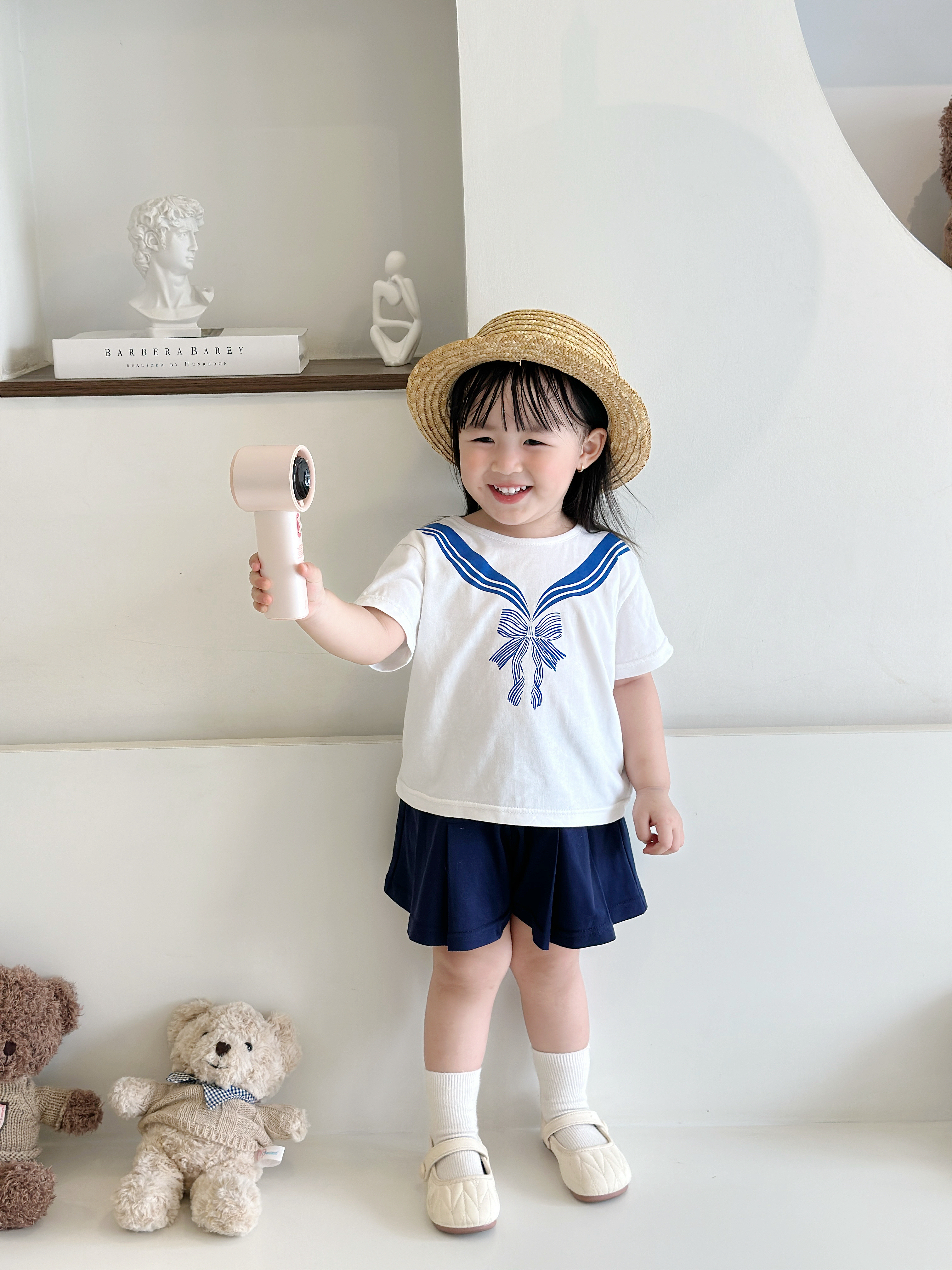 SB2314- bộ cộc tay in cổ thủy thủ nơ phối quần váy