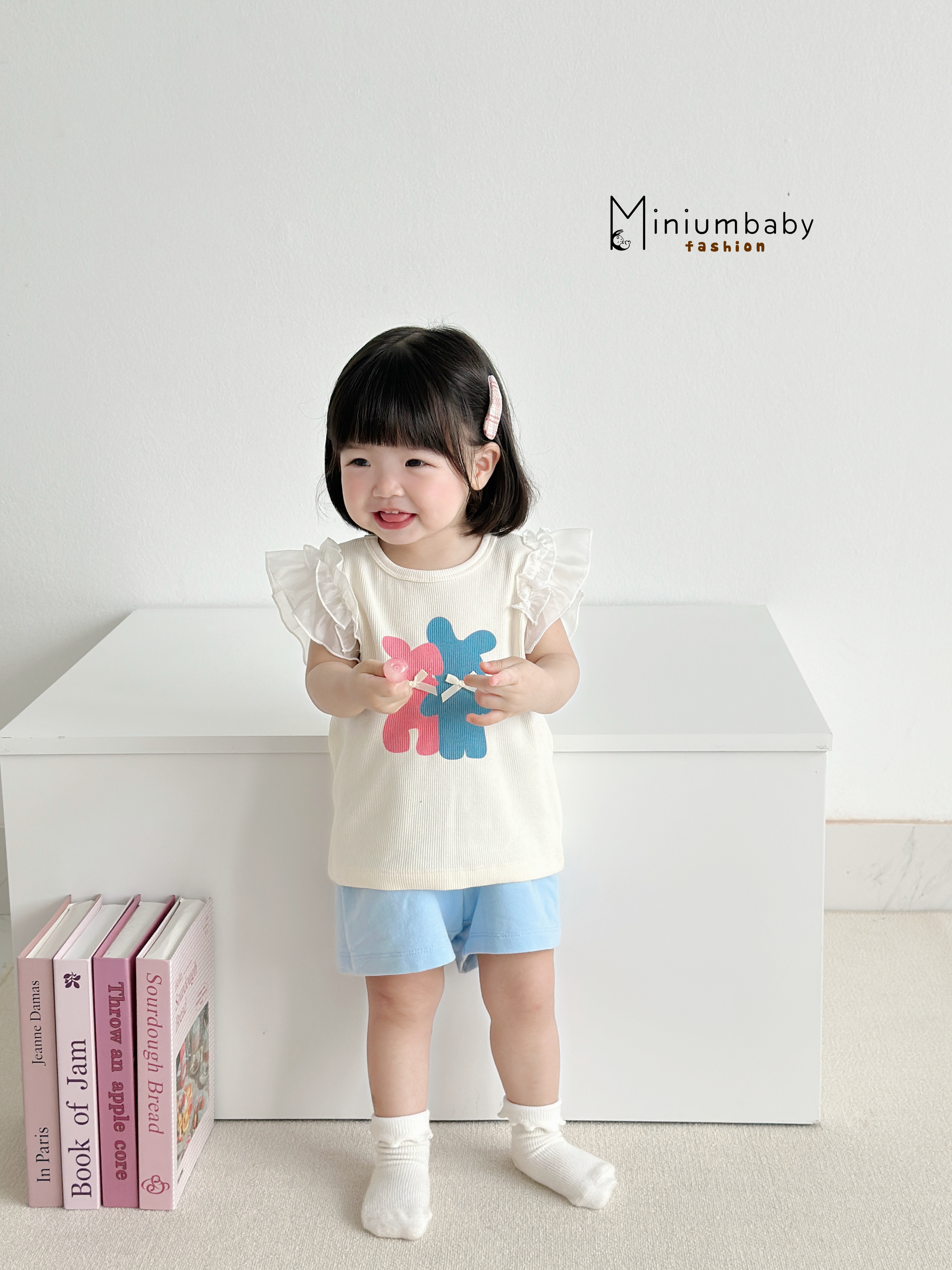 SB2313- bộ cánh tiên bé gái in gấu xanh hồng đính nơ