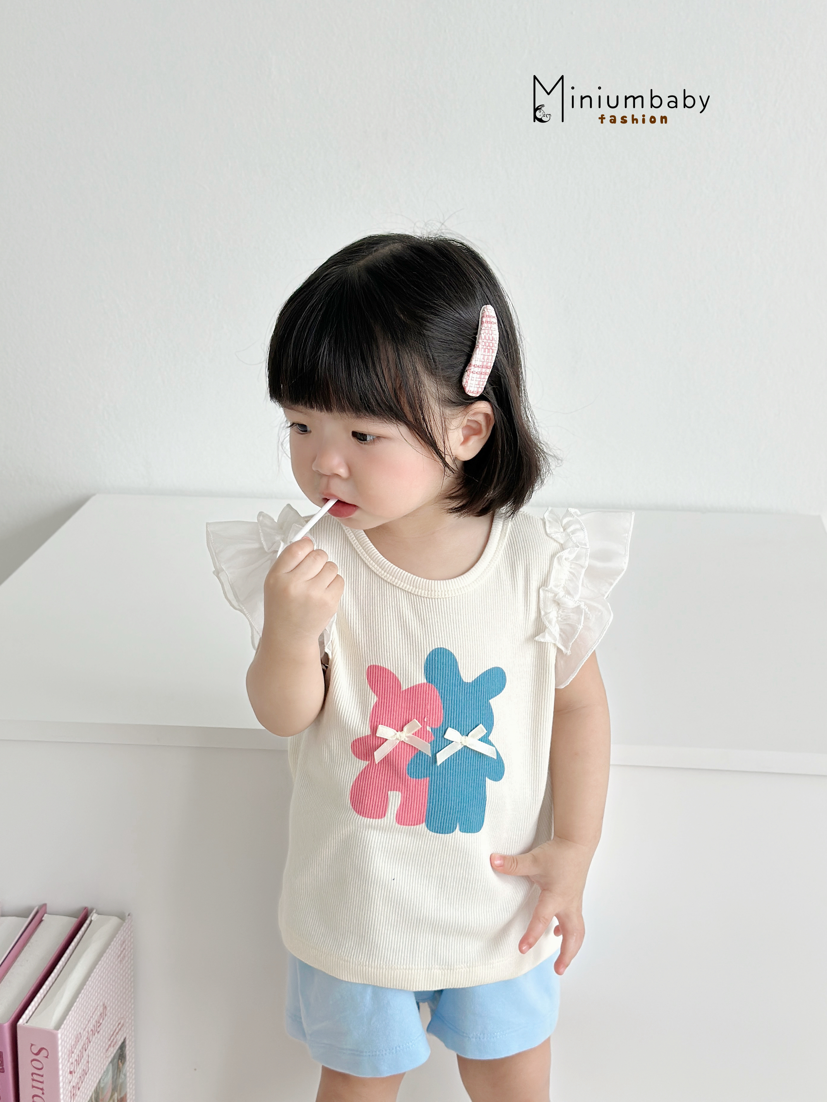 SB2313- bộ cánh tiên bé gái in gấu xanh hồng đính nơ