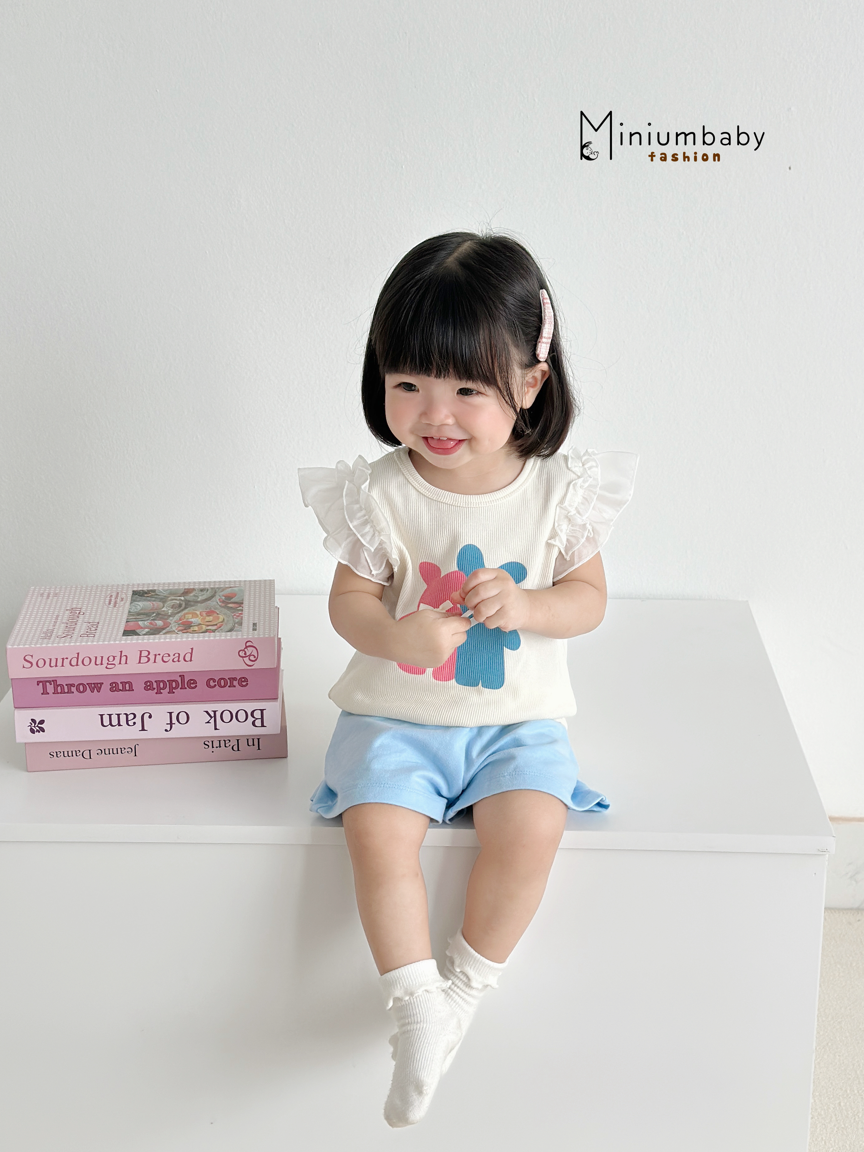 SB2313- bộ cánh tiên bé gái in gấu xanh hồng đính nơ